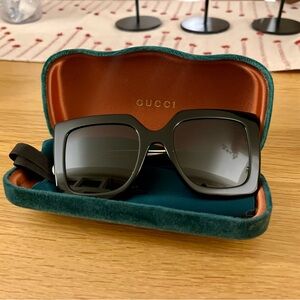 Beautiful oversized Gucci sunglasses. In original case and slip. Never worn.